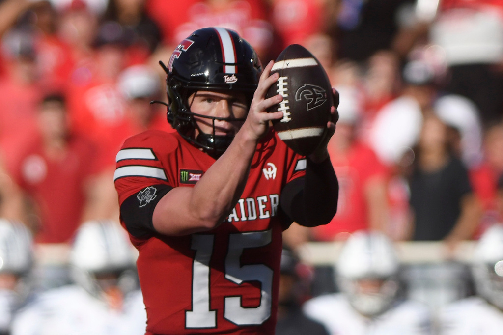 Texas Tech quarterback Will Hammond catches a snap during the first half of an NCAA college football game against Abilene Christian, Saturday, Sept. 5, 2026, in Lubbock, Texas. (AP Photo/Annie Rice)