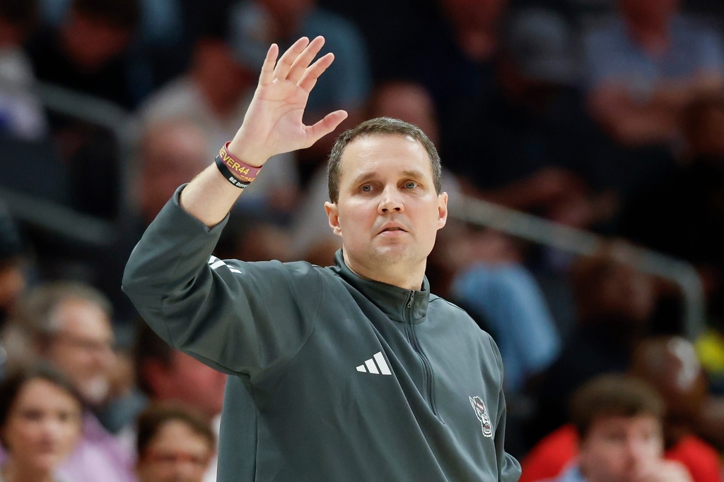 NC State head coach Will Wade directs his team against Pittsburgh during the second half of an NCAA college basketball game in the second round of the Atlantic Coast Conference tournament in Charlotte, N.C., Wednesday, March 11, 2026. (AP Photo/Nell Redmond)