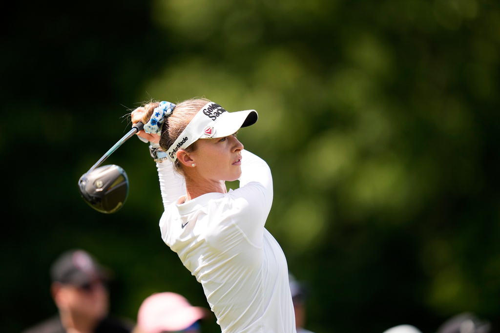Nelly Korda hits off the 13th tee during the first round of the LPGA FM Championship golf tournament in Norton, Mass., Thursday, Aug. 27, 2026. (AP Photo/Charles Krupa)