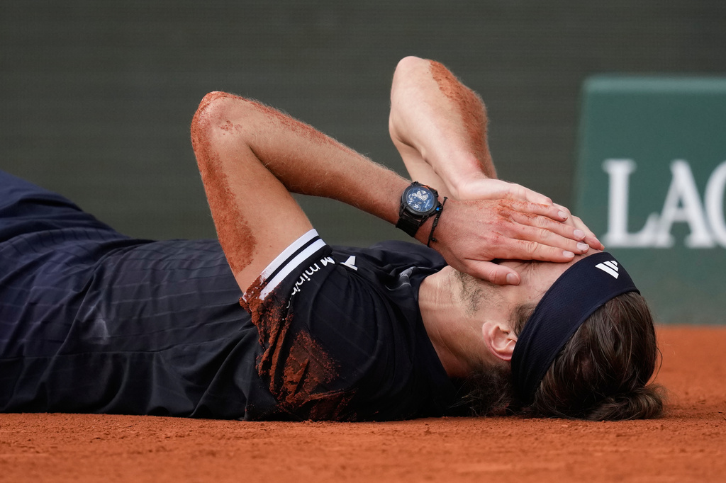 Alexander Zverev of Germany celebrates after winning the men's final match against Flavio Cobolli of Italy at the French Open tennis tournament in Paris, Sunday, June 7, 2026. (AP Photo/Christophe Ena)
