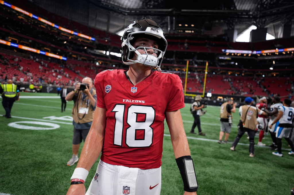 Atlanta Falcons quarterback Jack Strand (18) walks off the filed after an NFL football game against the Carolina Panthers in Atlanta, Sunday, Sept. 20, 2026. (AP Photo/Mike Stewart)