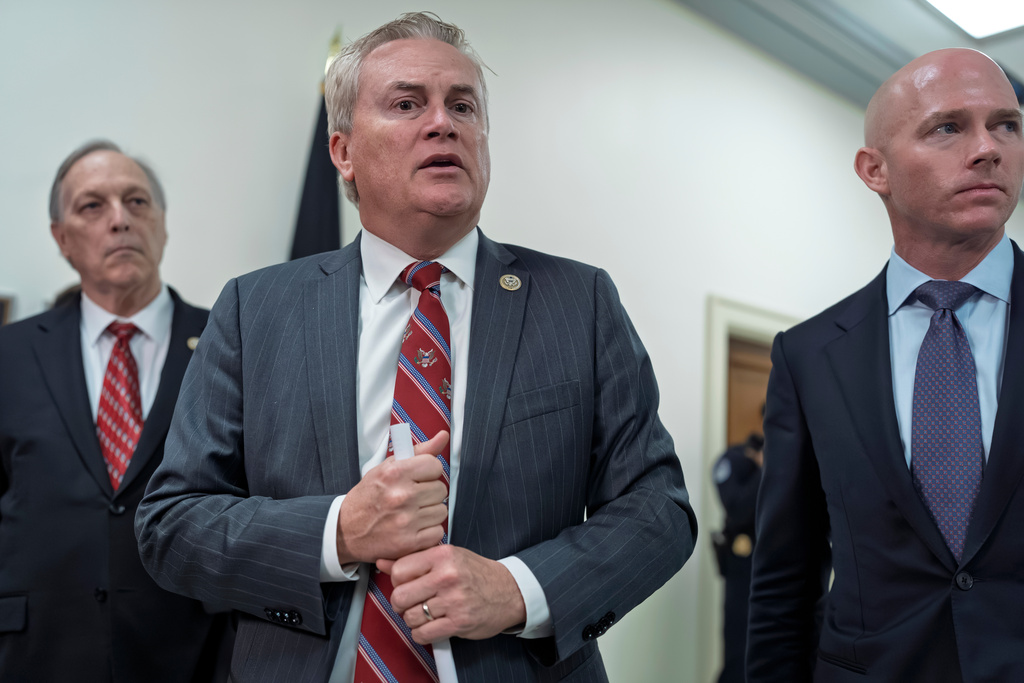 House Oversight Committee Chairman James Comer, R-Ky., flanked by Rep. Andy Biggs, R-Ariz., left, and Rep. William Timmons, R-S.C., speaks to reporters after a closed-door deposition with Ghislaine Maxwell, the former girlfriend and confidante of sex trafficker Jeffrey Epstein, at the Capitol in Washington, Monday, Feb. 9, 2026. (AP Photo/J. Scott Applewhite)