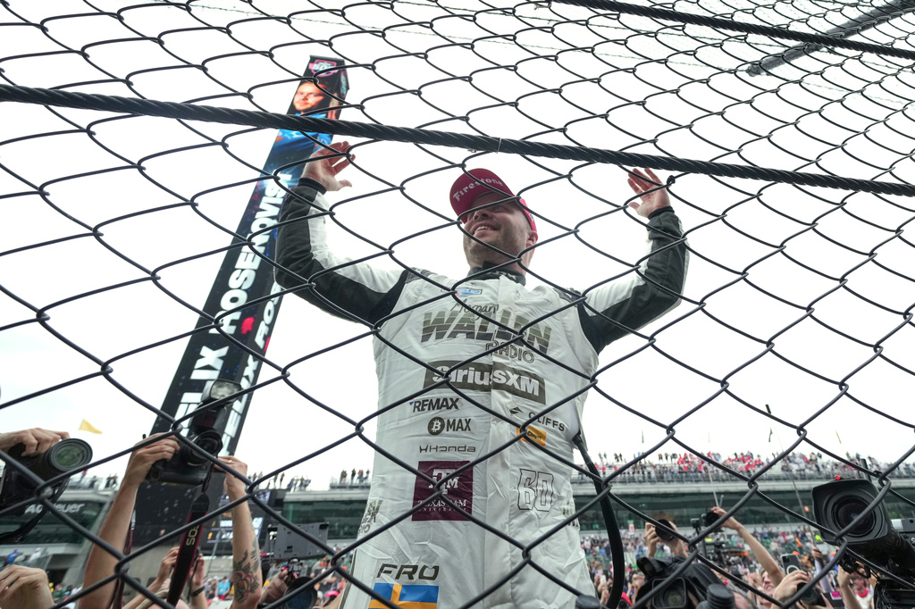 Felix Rosenqvist, of Sweden, celebrates after winning the Indianapolis 500 auto race at Indianapolis Motor Speedway in Indianapolis, Sunday, May 24, 2026. (AP Photo/AJ Mast)