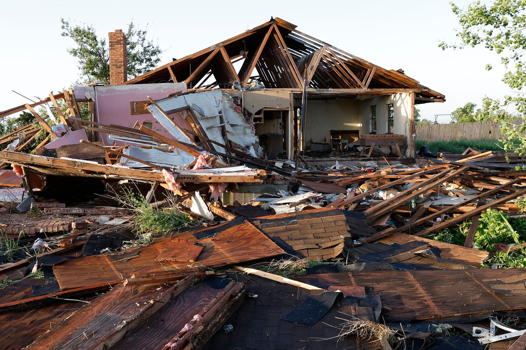 A view of a damaged home in Enid, Okla., Friday, April 24, 2026, in the aftermath of a tornado that barreled through Oklahoma Thursday. (AP Photo/Alonzo Adams)