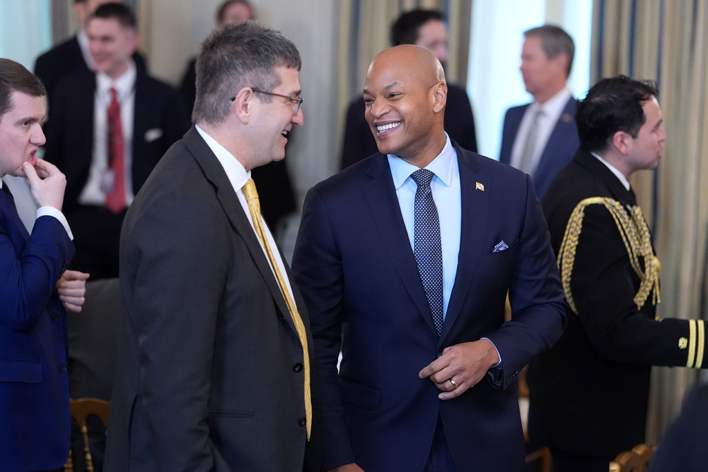 Maryland Gov. Wes Moore, right, and Delaware Gov. Matt Meyer attend a breakfast with the National Governors Association in the State Dining Room of the White House, Friday, Feb. 20, 2026, in Washington. (AP Photo/Evan Vucci)