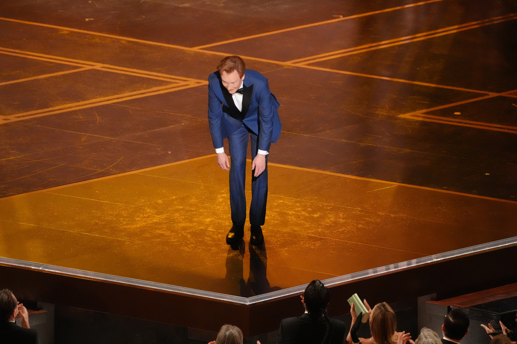 Host Conan O'Brien appears during the Oscars on Sunday, March 15, 2026, at the Dolby Theatre in Los Angeles. (AP Photo/Chris Pizzello)