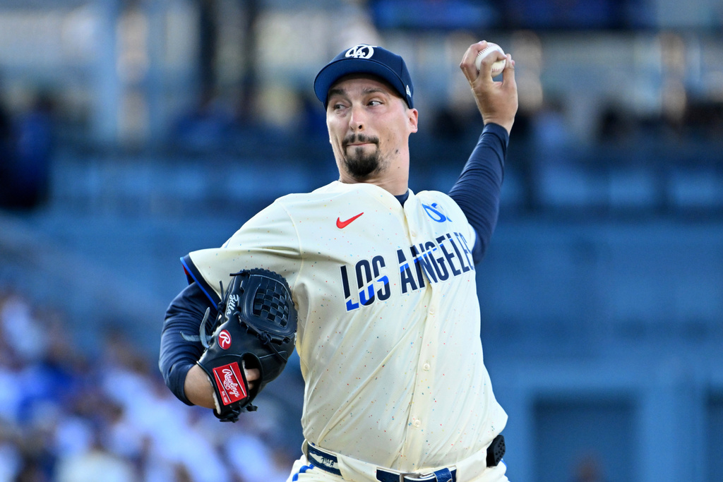 Los Angeles Dodgers pitcher Blake Snell throws against the San Diego Padres during the second inning of a baseball game Saturday, Aug. 16, 2025, in Los Angeles. (AP Photo/Wally Skalij)