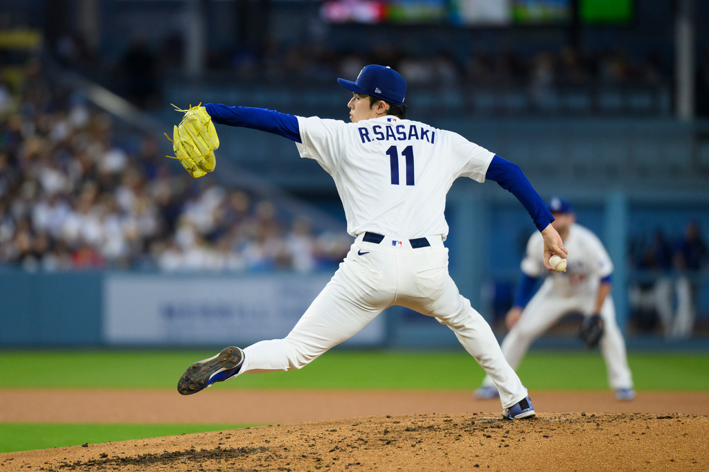 Los Angeles Dodgers starting pitcher Roki Sasaki delivers during the third inning of a baseball game against the San Diego Padres in Los Angeles, Thursday, July 2, 2026. (AP Photo/Kyusung Gong)