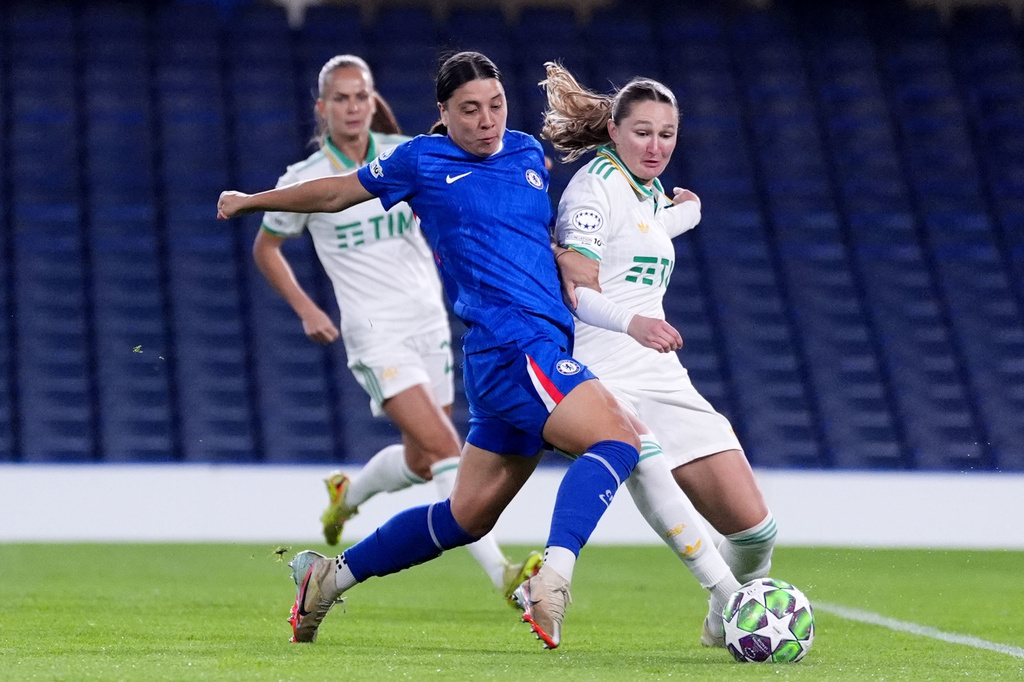 Roma's Winonah Heatley, right, and Chelsea's Sam Kerr in action during the Women's Champions League soccer match between Chelsea and Roma at Stamford Bridge, London, Wednesday Dec. 10, 2025. (Adam Davy/PA via AP)