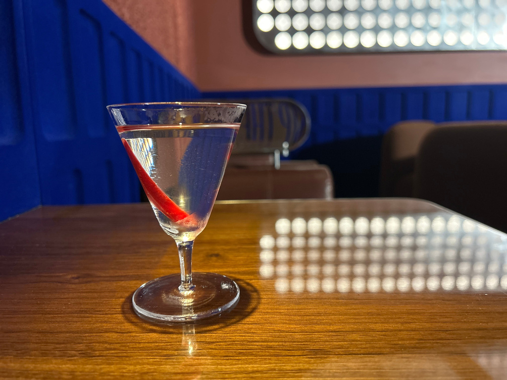 A spicy cocktail called Late Night, made with a brine mix of onion, olive, and sivri pepper, is displayed in London on June 24, 2026. (AP Photo/Louise Dixon)