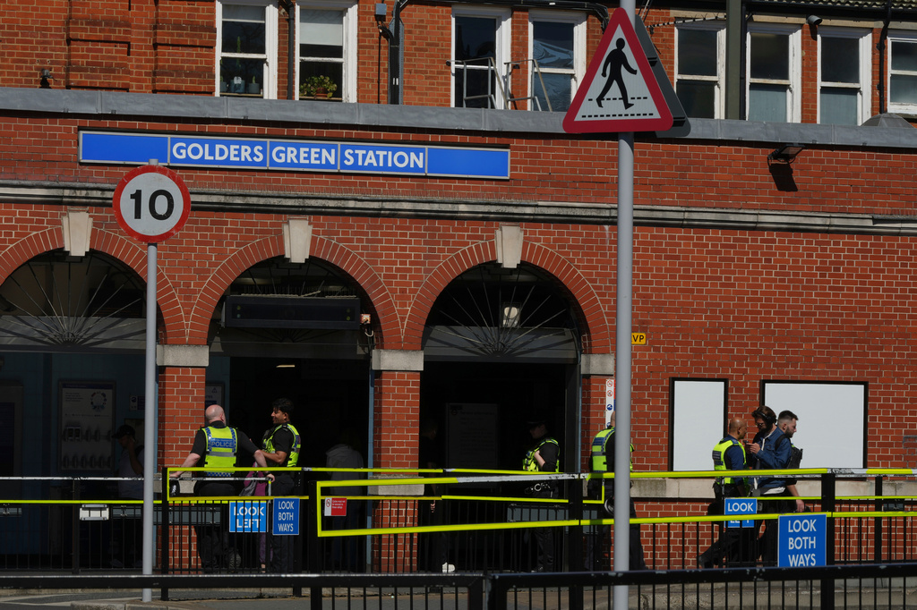 Police on duty outside Golders Green tube station in London, Thursday, April 30, 2026, near the scene where two people were recently stabbed in the Golders Green neighbourhood, that has a large Jewish community. (AP Photo/Alastair Grant)