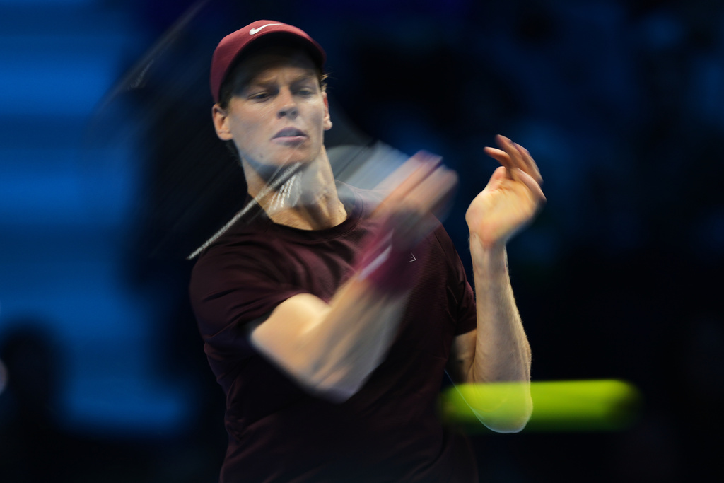 Italy¥s Jannik Sinner Canada¥s Felix Auger-Aliassime returns the ball to Italy¥s Jannik Sinner Canada¥s Felix Auger-Aliassime during their tennis match of the ATP World Tour Finals, in Turin, Italy, Monday, Nov. 10, 2025. (AP Photo/Antonio Calanni)