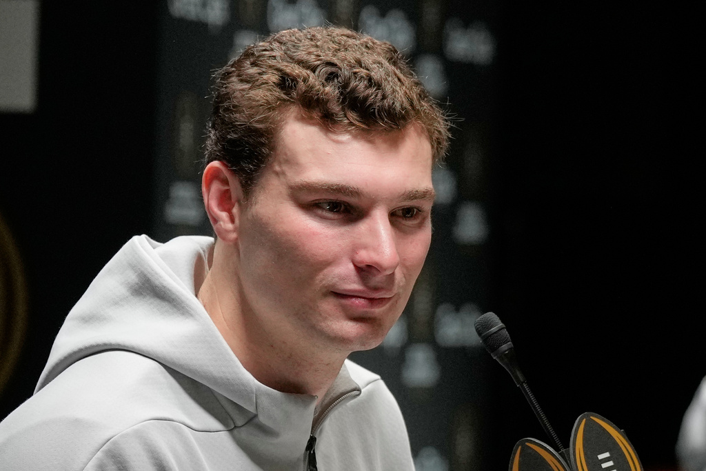 Indiana quarterback Fernando Mendoza speaks during media day ahead of the College Football Playoff national championship game between Miami and Indiana, Saturday, Jan. 17, 2026, in Miami. The game will be played on Monday. (AP Photo/Chris Carlson)