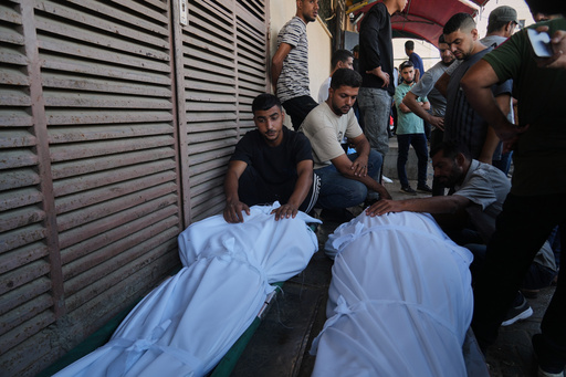 Mourners attend the funeral of Palestinians killed in an Israeli army strike, outside Al-Aqsa Hospital in Deir al-Balah, central Gaza Strip, Saturday, Oct. 4, 2025. (AP Photo/Abdel Kareem Hana) Mourners attend the funeral of Palestinians killed in an Israeli army strike, outside Al-Aqsa Hospital in Deir al-Balah, central Gaza Strip, Saturday, Oct. 4, 2025. (AP Photo/Abdel Kareem Hana)