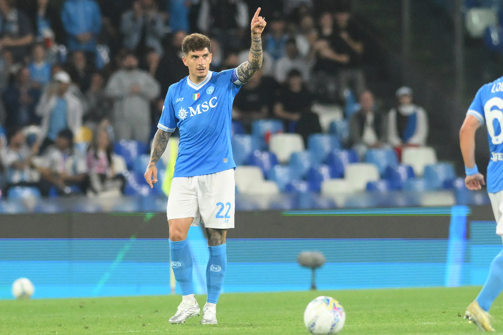 Napoli's Giovanni Di Lorenzo celebrates after scoring during the Italian Serie A soccer match between Napoli and Bologna in Naples, Italy, Monday, May 11, 2026. (Alessandro Garofalo/LaPresse via AP)