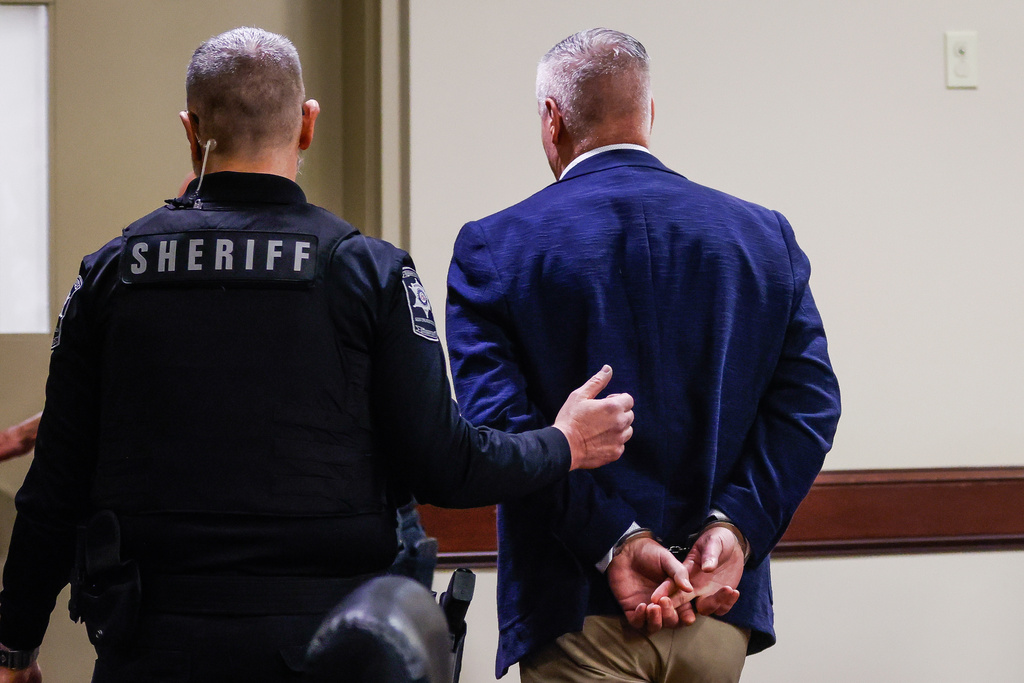 Colin Gray, the father of Apalachee High School shooting suspect Colt Gray, is handcuffed and escorted out of the room after jury deliberations at his trial at Barrow County Courthouse in Winder, Ga., Tuesday, March 3, 2026. (Abbey Cutrer/Atlanta Journal-Constitution via AP, Pool)