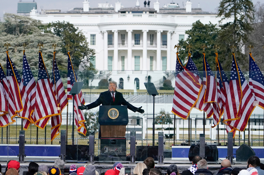 FILE - With the White House in the background, President Donald Trump speaks at a rally on Jan. 6, 2021, in Washington. (AP Photo/Jacquelyn Martin, file)