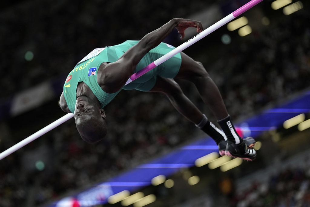 Australia's Yual Reath makes an attempt in the men's high jump final at the World Athletics Championships in Tokyo, Tuesday, Sept. 16, 2025. (AP Photo/Matthias Schrader)