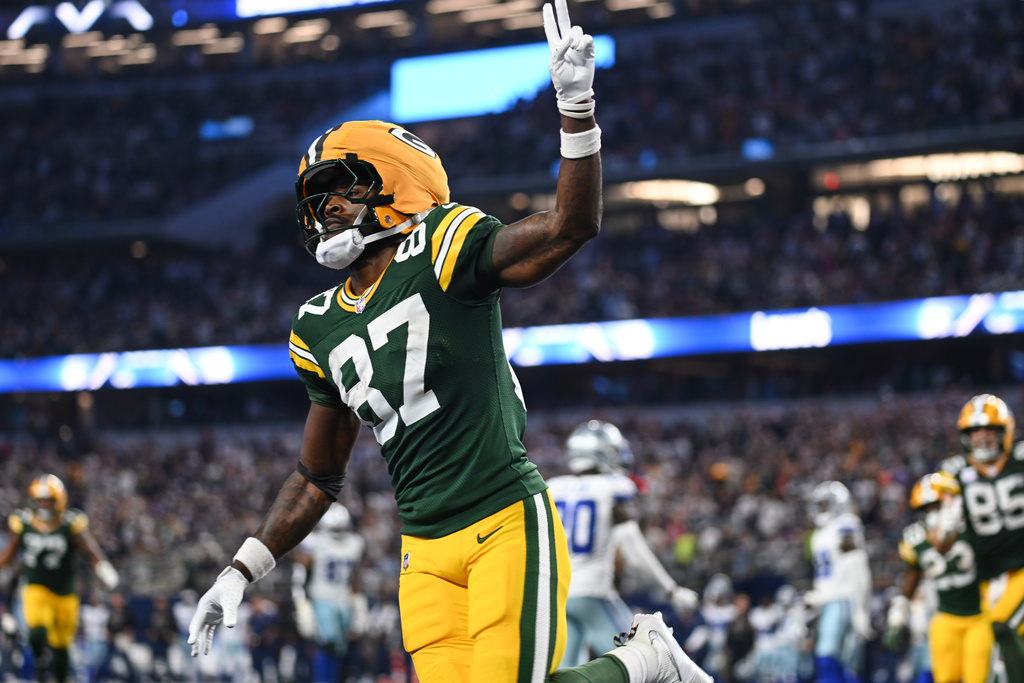 Green Bay Packers wide receiver Romeo Doubs (87) celebrates his touchdown catch in the second half of an NFL football game against the Dallas Cowboys Sunday, Sept. 28, 2025, in Arlington, Texas. (AP Photo/Jessica Tobias)