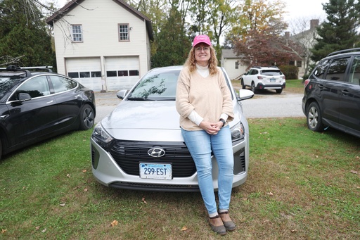 Lynn Mellis Worthington poses for a portrait with her hybrid vehicle Saturday, Oct. 11, 2025, in Kent, Conn. (AP Photo/Heather Khalifa) Lynn Mellis Worthington poses for a portrait with her hybrid vehicle Saturday, Oct. 11, 2025, in Kent, Conn. (AP Photo/Heather Khalifa)