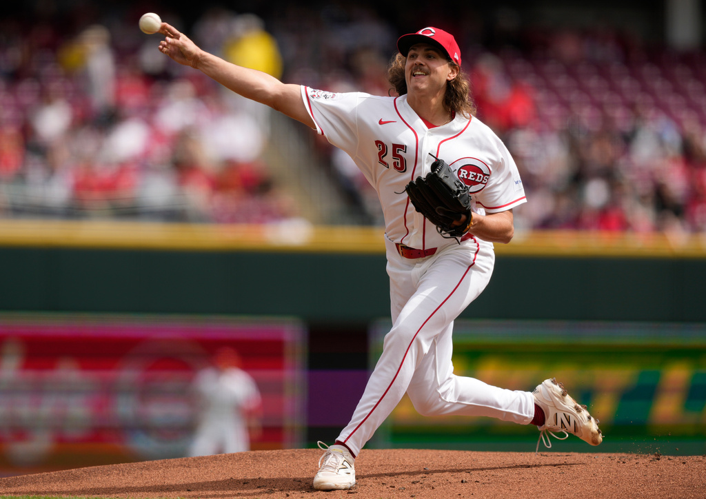 Cincinnati Reds pitcher Rhett Lowder throws during the first inning of a baseball game between the Cincinnati Reds and the Boston Red Sox in Cincinnati, Sunday, March 29, 2026. (AP Photo/Carolyn Kaster)