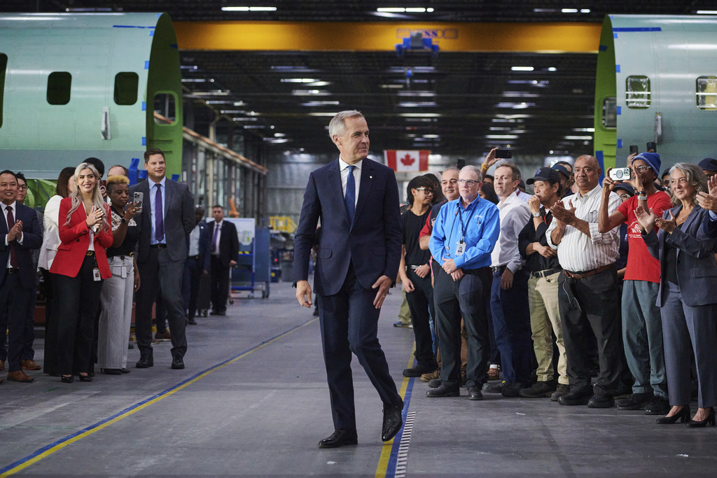 Prime Minister Mark Carney arrives at a press conference in Mississauga, Ont., on Friday, Sept. 5, 2025. (Sammy Kogan/The Canadian Press via AP)