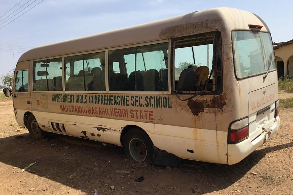 A view of the school bus of the Government Girls Comprehensive Secondary School, where gunmen on Monday attacked the school dormitory and abducted schoolgirls, is seen in Kebbi, Nigeria, Tuesday, Nov. 18, 2025. (AP Photo/Tunde Omolehin)