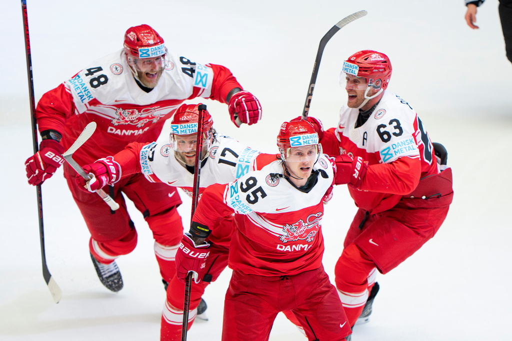FILE - Denmark's Nick Olesen (95) celebrates with teammates after scoring the winning goal in a quarterfinal game between Canada and Denmark at the hockey world championships, May 22, 2025, in Herning, Denmark. (Bo Amstrup/Ritzau Scanpix via AP, File)