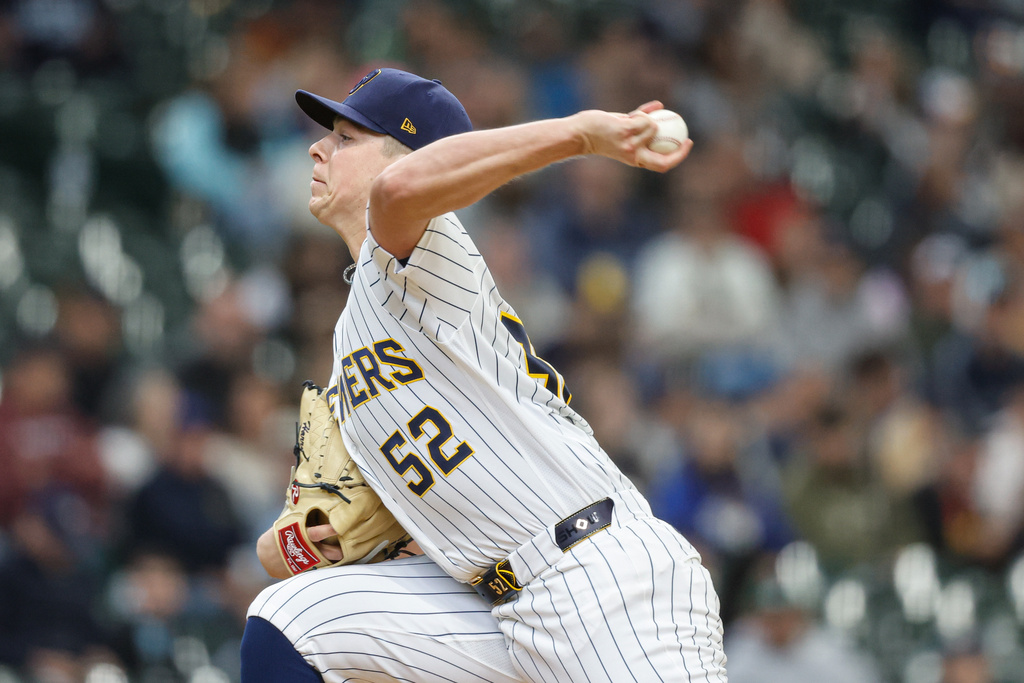 Milwaukee Brewers pitcher Kyle Harrison (52) throws during the first inning of a baseball game against the Pittsburgh Pirates Sunday, April 26, 2026, in Milwaukee. (AP Photo/Jeffrey Phelps)
