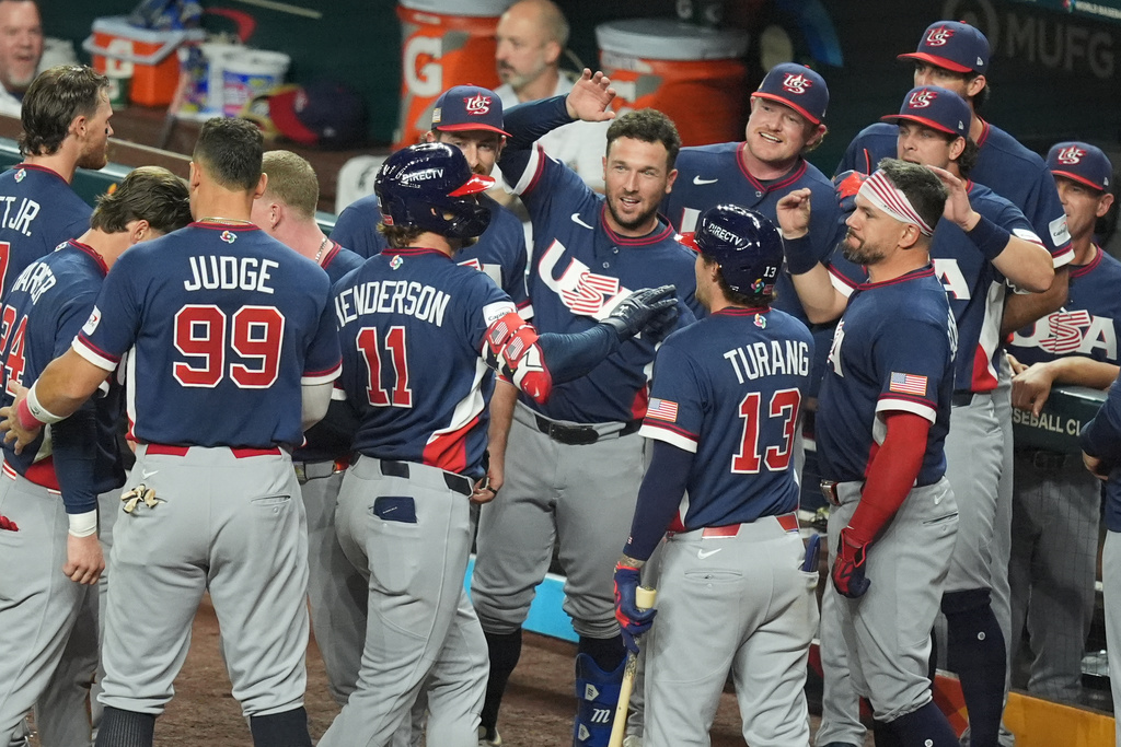 United States' Gunnar Henderson (11) celebrates his home run during the fourth inning of a World Baseball Classic semifinal game against the Dominican Republic, Sunday, March 15, 2026, in Miami. (AP Photo/Rebecca Blackwell)