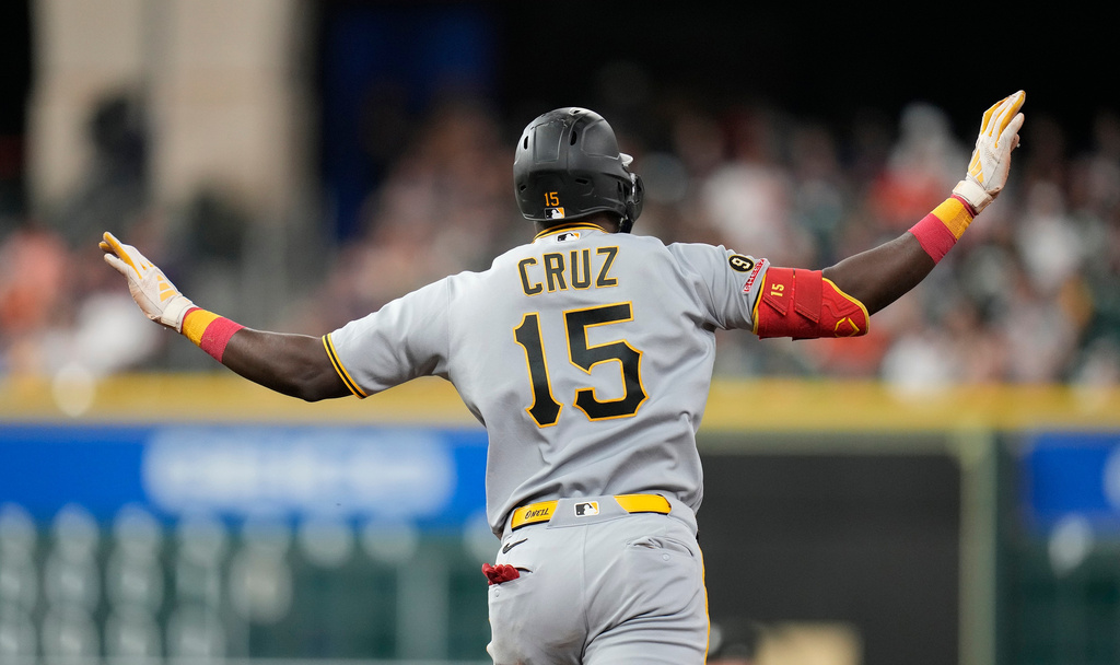 Pittsburgh Pirates' Oneil Cruz (15) celebrates his three-run home run against Houston Astros starting pitcher Mike Burrows during the sixth inning of a baseball game, Tuesday, June 2, 2026, in Houston. (AP Photo/Karen Warren)