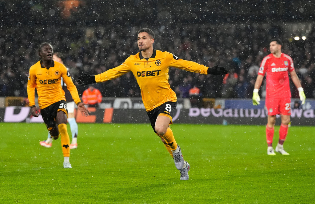 Wolverhampton Wanderers' Joao Gomes celebrates scoring their side's first goal of the game during their English Premier League soccer match against Aston Villa in Wolverhampton, England, Friday, Feb. 27, 2026. (Nick Potts/PA via AP)