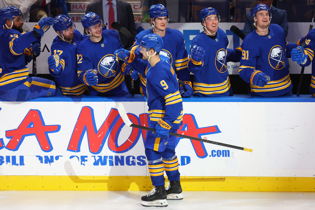 Buffalo Sabres center Josh Norris (9) celebrates his goal during the third period of an NHL hockey game against the Winnipeg Jets, Monday, Dec. 1, 2025, in Buffalo, N.Y. (AP Photo/Jeffrey T. Barnes)