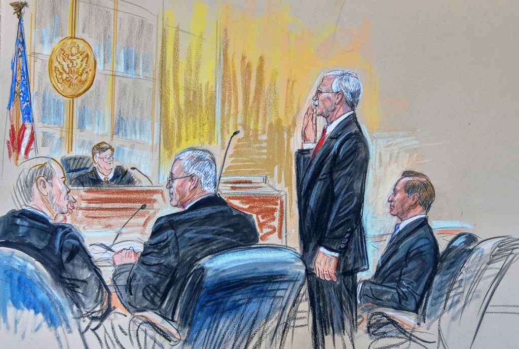 This courtroom sketch depicts former Trump administration national security adviser John Bolton, second from right, swearing in, while joined by his attorney Abbe Lowell, right, federal prosecutor Thomas Sullivan, third from left, and Judge Timothy J. Sullivan, second from left, during his arraignment at the federal courthouse in Greenbelt, Md., Friday, Oct. 17, 2025. (Dana Verkouteren via AP)