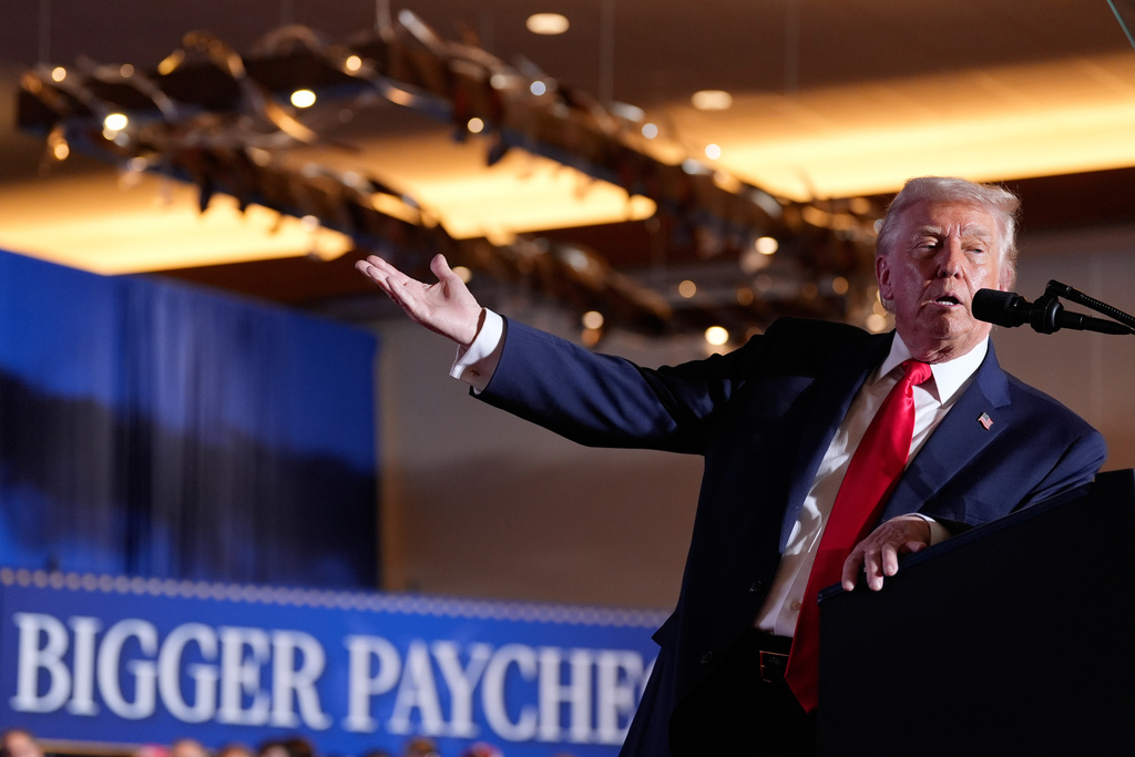 FILE - President Donald Trump gestures to a chart as he speaks at Mount Airy Casino Resort, Dec. 9, 2025, in Mount Pocono, Pa. (AP Photo/Alex Brandon, File)