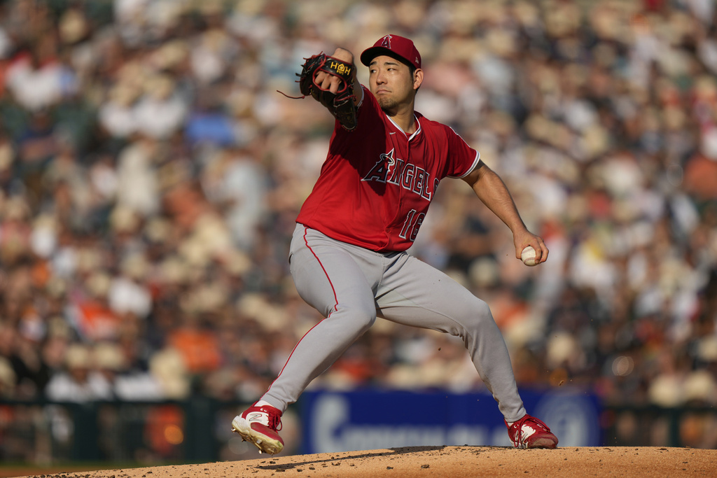 Los Angeles Angels starting pitcher Yusei Kikuchi throws during the first inning of a baseball game against the Detroit Tigers, Saturday, Aug. 9, 2025, in Detroit. (AP Photo/Ryan Sun)