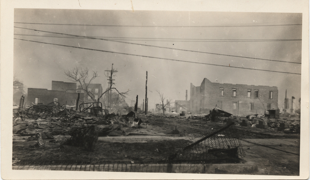 This photo provided by The University of Tulsa shows ruins after the Tulsa Race Massacre, June 1, 1921, in Tulsa, Okla. (The University of Tulsa McFarlin Library/Department of Special Collections and University Archives via AP)