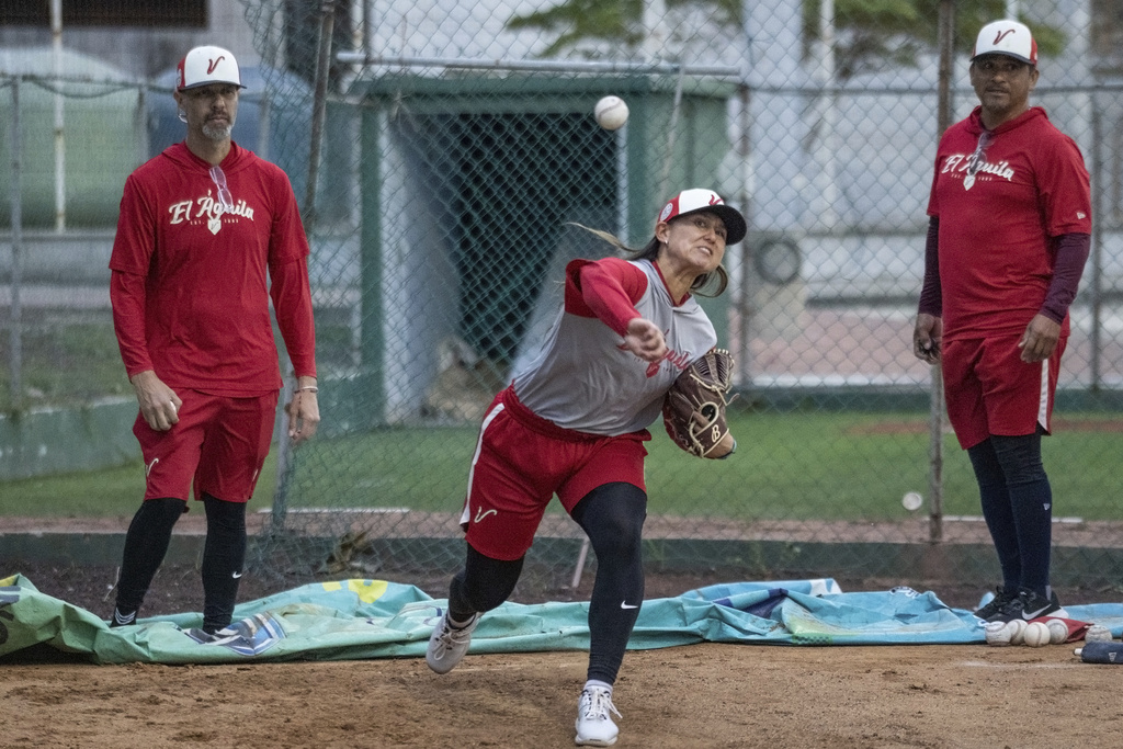 FILE - Player Kelsie Whitmore throws a ball during a training session with the Aguila de Veracruz profesional baseball team in Veracruz, Mexico, Tuesday, April 8, 2025. (AP Photo/Victoria Razo, File)