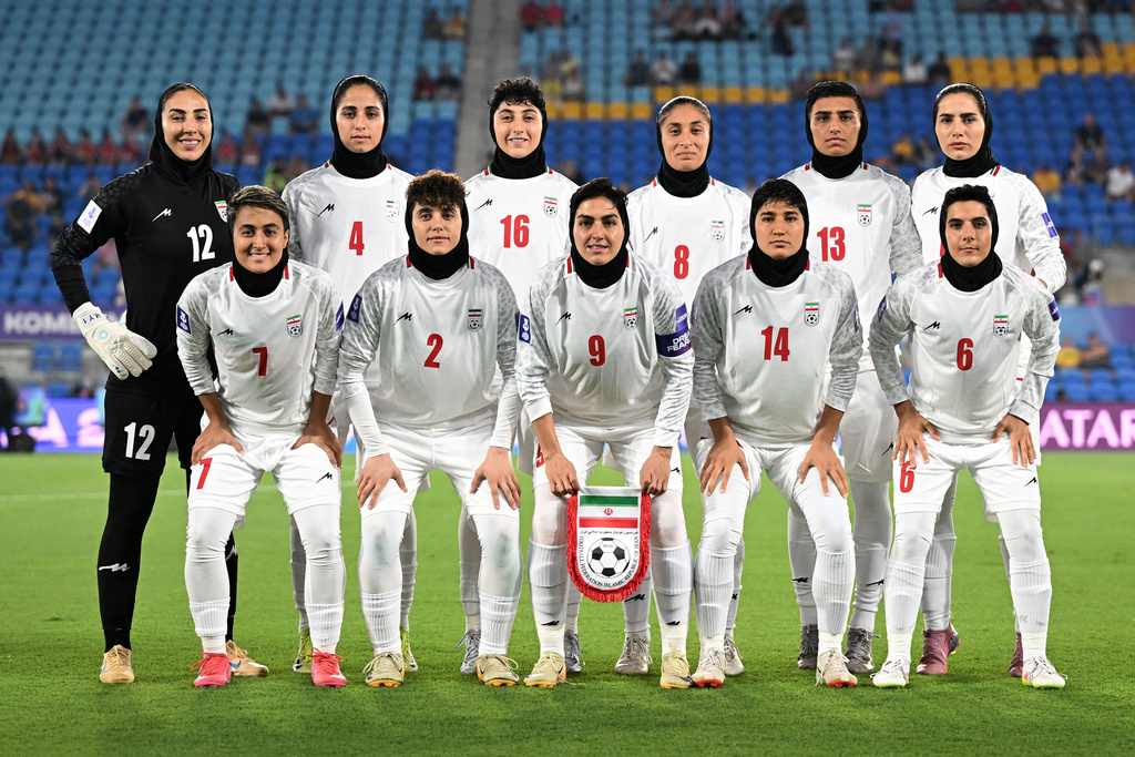 Iran players pose for a team photo ahead of the Women's Asia Cup soccer match between Iran and South Korea on the Gold Coast, Australia, Monday, March 2, 2026. (Dave Hunt/AAPImage via AP)/AAP Image via AP)/AAP Image via AP)
