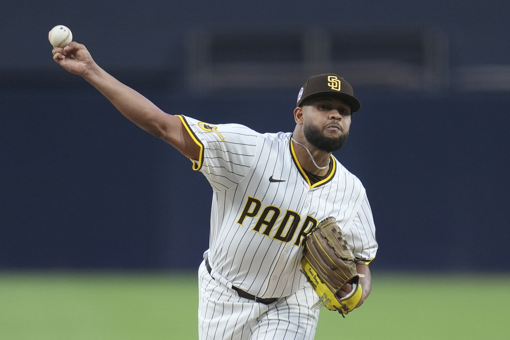San Diego Padres starting pitcher Randy Vasquez works against a Colorado Rockies batter during the first inning of a baseball game Thursday, Sept. 11, 2025, in San Diego. (AP Photo/Gregory Bull)