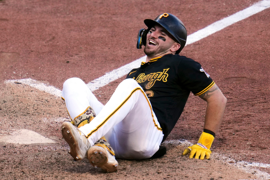 Pittsburgh Pirates' Spencer Horwitz reacts after being hit by a pitch from Miami Marlins' Anthony Bender with bases loaded during the eighth inning of a baseball game in Pittsburgh, Saturday, June 13, 2026. (AP Photo/Gene J. Puskar)