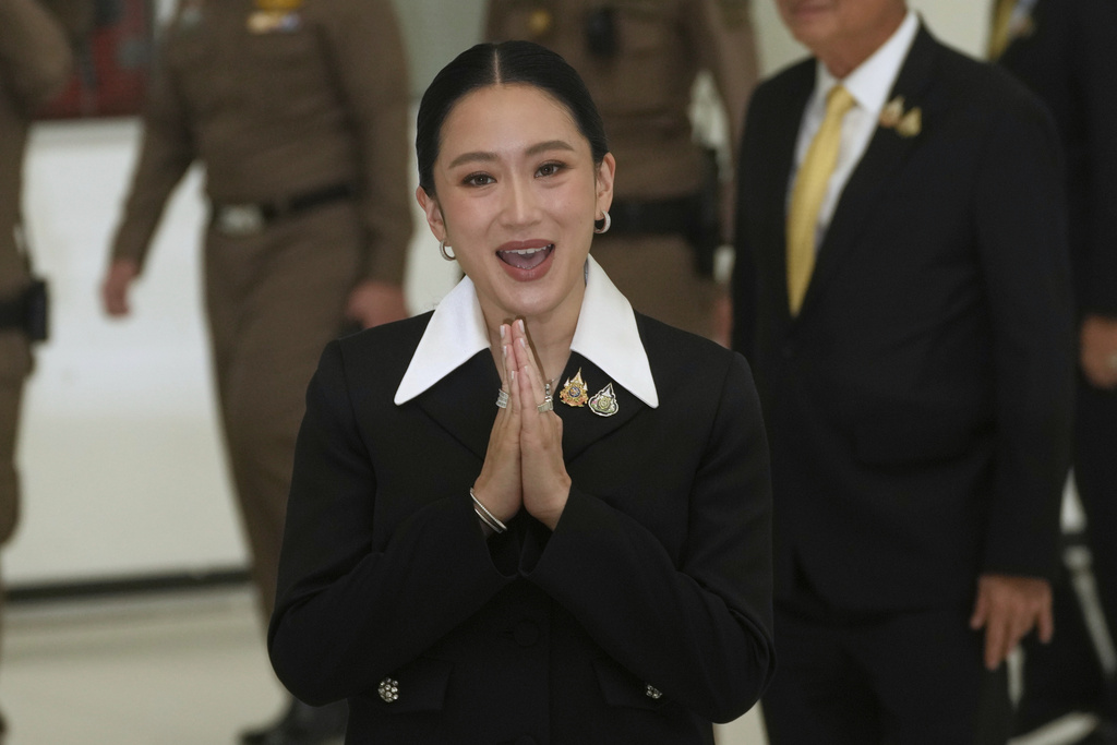 Thailand's suspended Prime Minister Paetongtarn Shinawatra arrives at Constitution Court to give testimony in Bangkok, Thailand, Thursday, Aug. 21, 2025. (AP Photo/Sakchai Lalit)