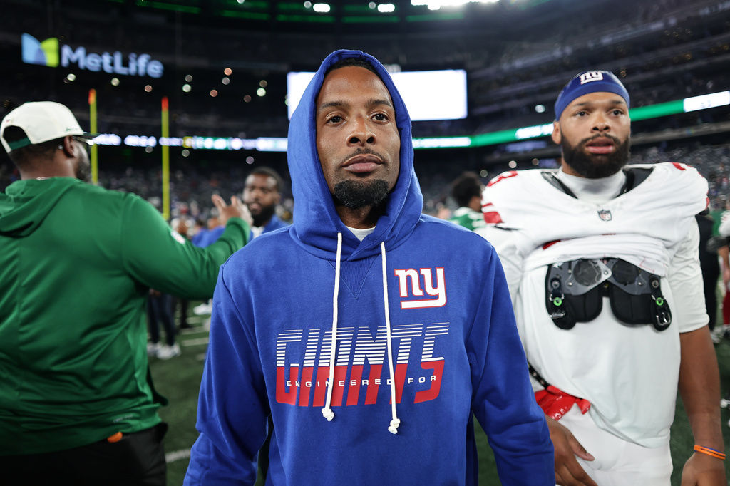 New York Giants wide receiver Odell Beckham Jr. (3) walk on the field after a preseason NFL football game against the New York Jets, Friday, Aug. 28, 2026, in East Rutherford, N.J. (AP Photo/Adam Hunger)