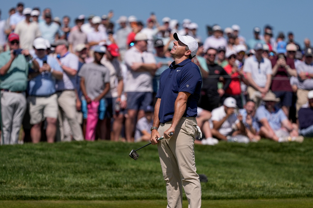 Rory McIlroy, of Northern Ireland, reacts to a missed putt on the seventh green during the final round of the PGA Championship golf tournament at Aronimink Golf Club, Sunday, May 17, 2026, in Newtown Square, PA. (AP Photo/Matt Slocum)