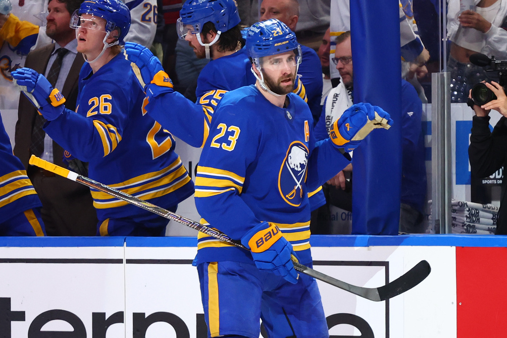 FILE - Buffalo Sabres defenseman Mattias Samuelsson (23) celebrates after his goal during the second period in Game 7 of a second-round NHL hockey Stanley Cup playoff series against the Montreal Canadiens, May 18, 2026, in Buffalo, N.Y. (AP Photo/Jeffrey T. Barnes, File)