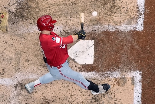 Cincinnati Reds' TJ Friedl hits a two-run RBI single during the third inning of a baseball game against the Milwaukee Brewers Saturday, Sept. 27, 2025, in Milwaukee. (AP Photo/Morry Gash) Cincinnati Reds' TJ Friedl hits a two-run RBI single during the third inning of a baseball game against the Milwaukee Brewers Saturday, Sept. 27, 2025, in Milwaukee. (AP Photo/Morry Gash)