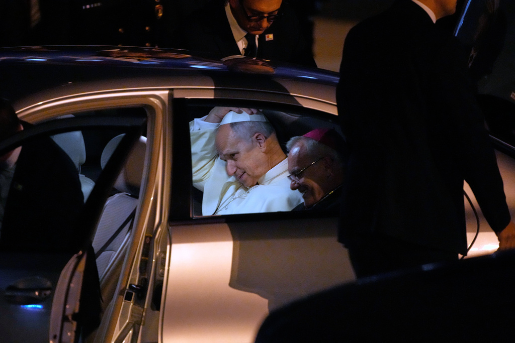 Pope Leo XIV sits in a car upon his arrival to Ataturk airport, in Istanbul, Turkey, Thursday, Nov. 27, 2025, during the first of his six-day trip to Turkey and Lebanon. (AP Photo/Emrah Gurel)