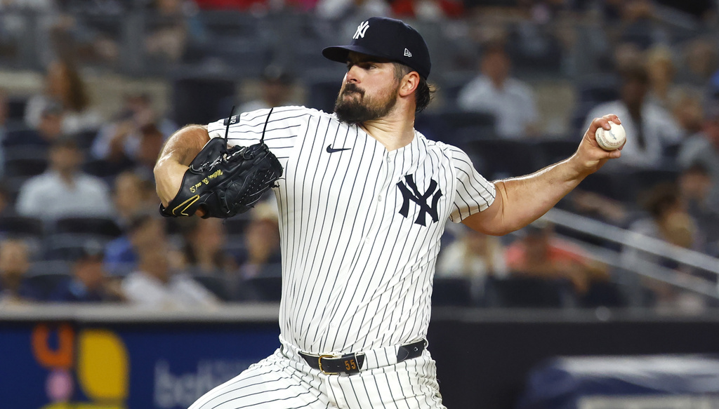 New York Yankees' Carlos Rodón throws during the sixth inning of a baseball game against the Boston Red Sox, Sunday, Aug. 24, 2025, in New York. (AP Photo/Noah K. Murray)