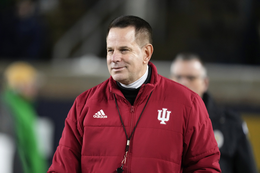 FILE - Indiana head coach Curt Cignetti looks on during warmups in the first round of the College Football Playoff against Notre Dame, Dec. 20, 2024, in South Bend, Ind. (AP Photo/Darron Cummings, File)