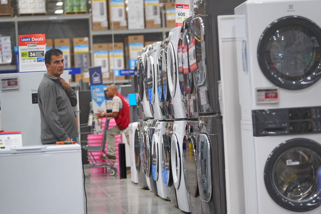 A shopper looks at appliances at a hardware store Tuesday, Oct. 6, 2026, in Dallas. (AP Photo/LM Otero)